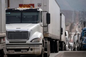 Cross-border freight truck at warehouse loading dock